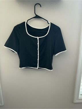 White Trim 2 Piece. Black Cropped Button-Front Top with Bellbottom Pants